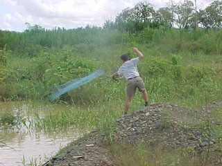 The author collecting in the Rio Guapo using a cast net